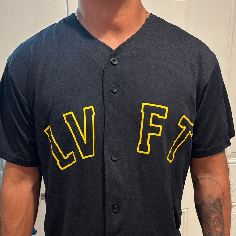 Black Shirt with Yellow Lettering